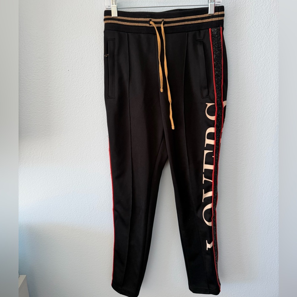 AMIRI Black Lovers Track Pants with Leather Brand Tag
